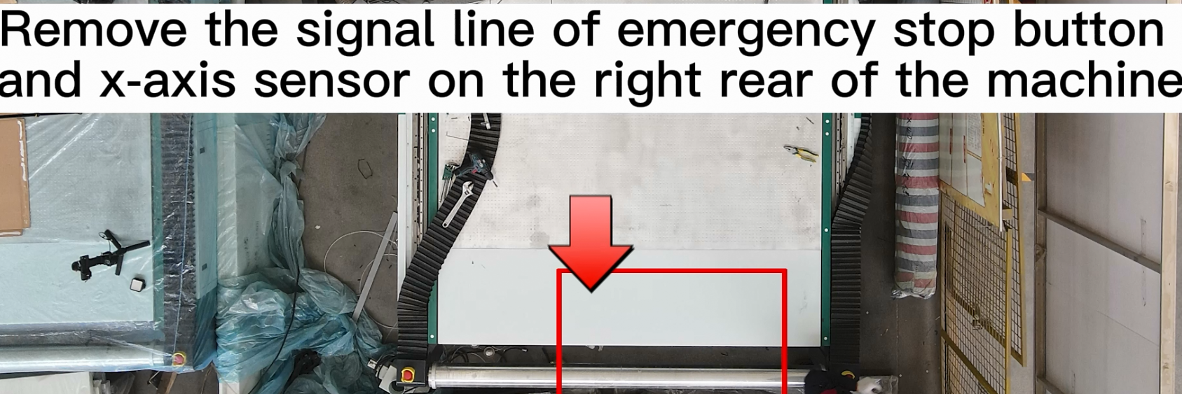 Emergency stop and X-axis limit on the left rear side.png
